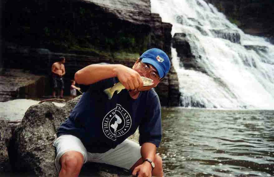 Fly fishing at Ithaca Fall